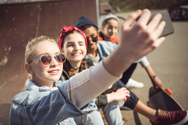 Teenagers taking selfie 