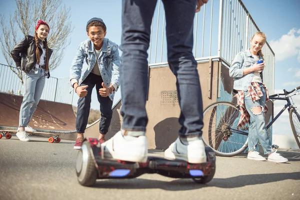 Hipster menino montando gyroboard — Fotografia de Stock