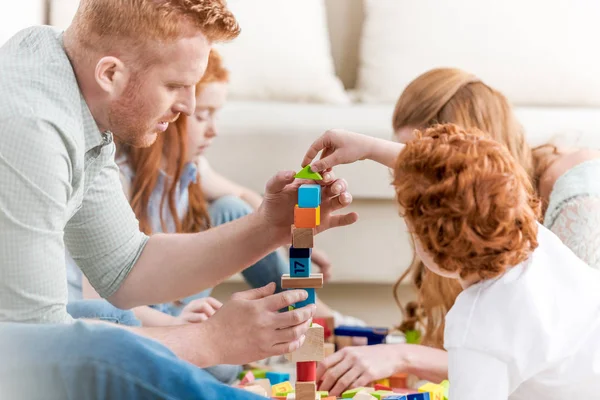 Family playing with constructor — Stock Photo, Image