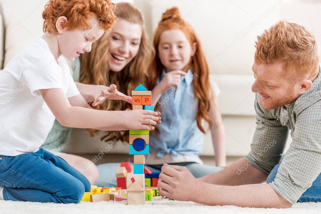 family playing with constructor 