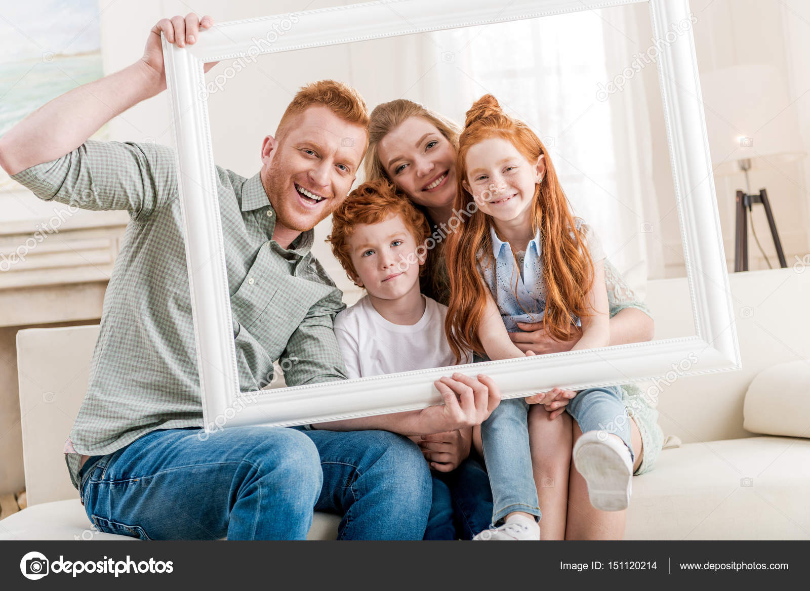 Beautiful redhead family — Stock Photo © ArturVerkhovetskiy 151120214