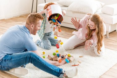 family playing with toys clipart