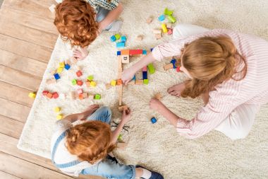 family playing with toys clipart