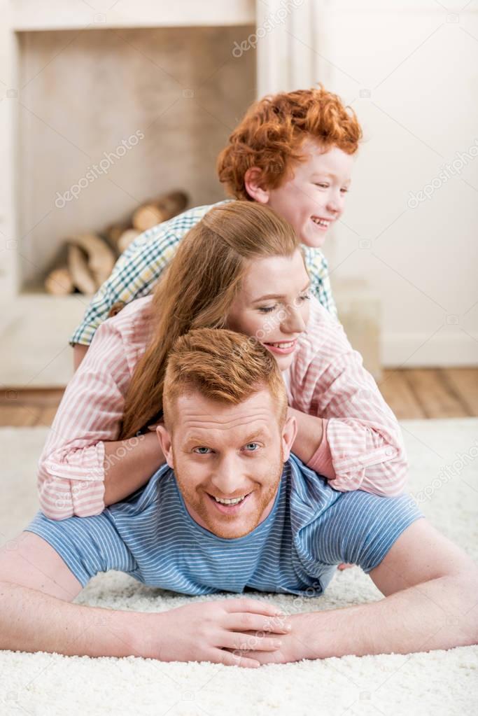 Parents playing with son 