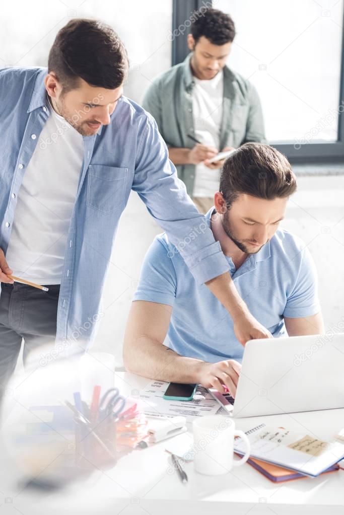 casual businessmen working at office