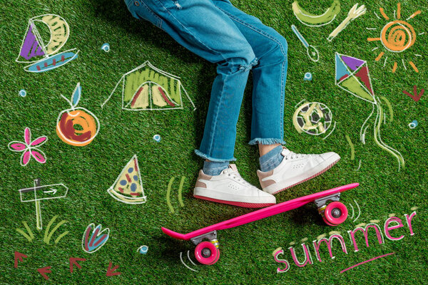 Cropped image girl on skateboard