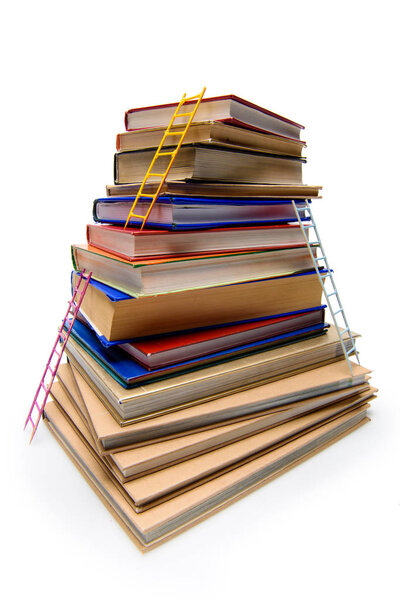 stack of books with ladders