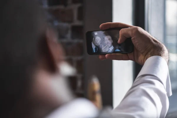 Business colleagues taking selfie together on digital  smartphone — Stock Photo, Image