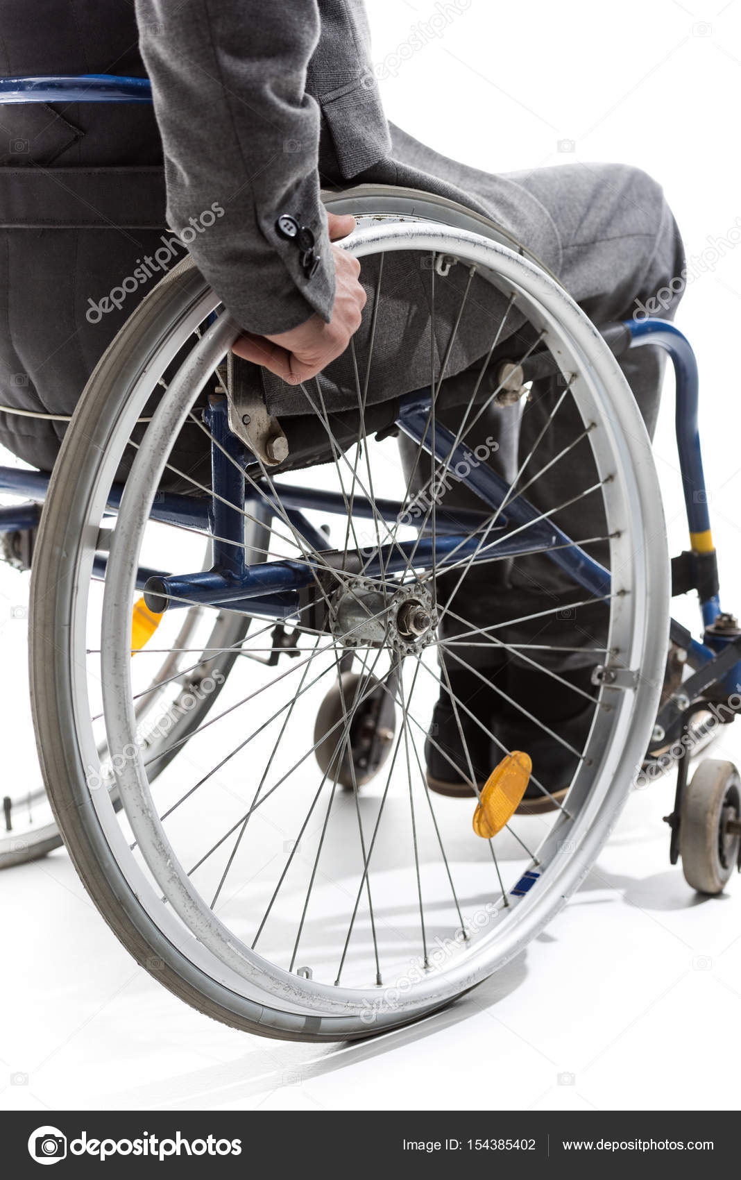 Physically handicapped man on wheelchair Stock Photo by
