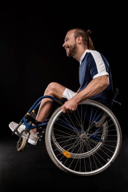 paralympic in wheelchair smiling clipart