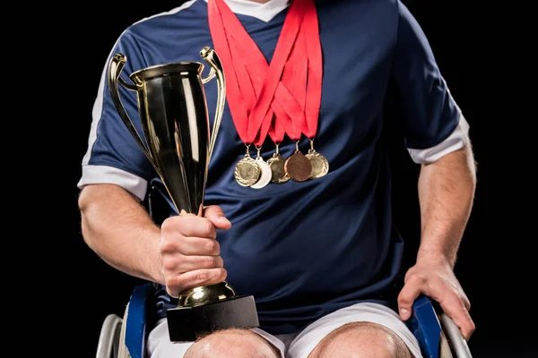 Paralympic in wheelchair with trophies — Stock Photo, Image