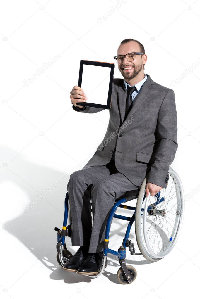 physically handicapped businessman with digital tablet