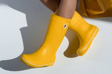 woman in yellow rubber boots 