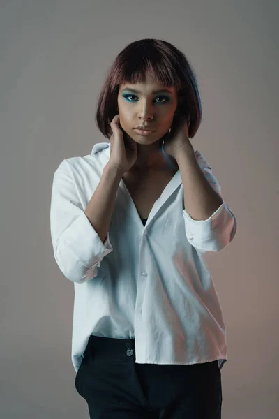 Stylish woman looking at camera — Stock Photo, Image