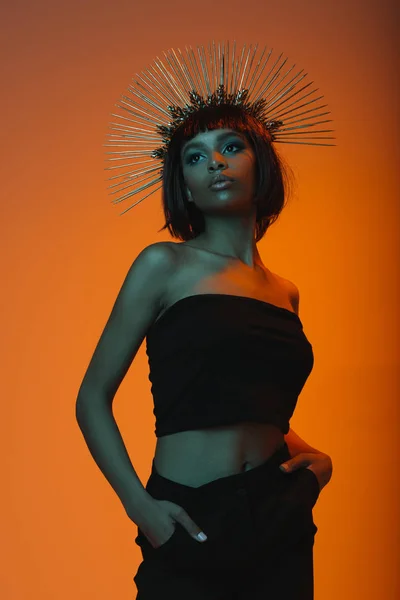 African american woman in headpiece with needles — Stock Photo, Image