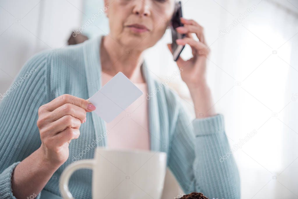 senior woman talking on smartphone