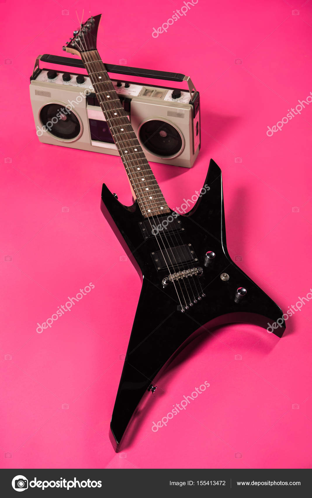 Electric guitar and tape recorder — Stock Photo © ArturVerkhovetskiy
