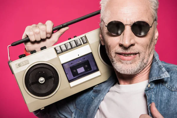 Man holding tape recorder — Stock Photo, Image