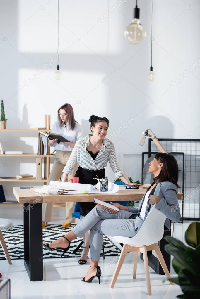 multiethnic businesswomen working at office