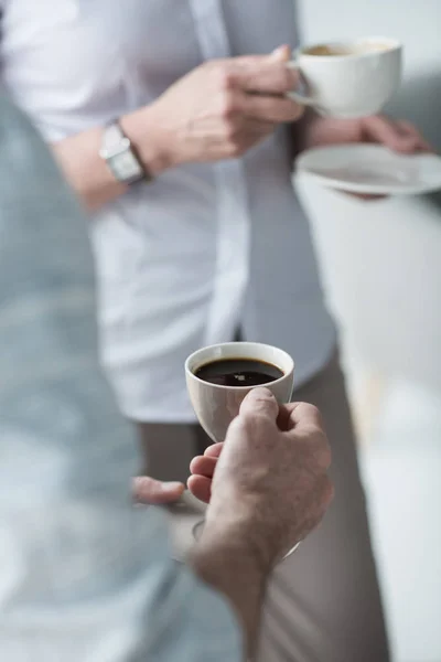 Senior colleagues converse at office — Stock Photo, Image