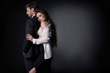 sexy girl hugging handsome man clipart