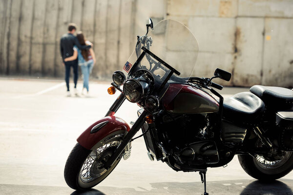 Young couple with motorcycle 