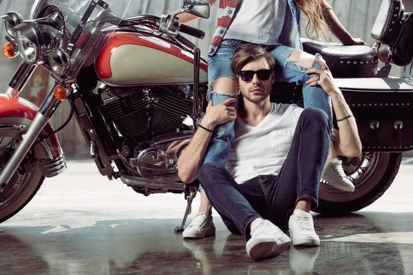 Young couple with motorcycle — Stock Photo, Image