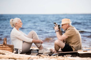 Senior couple at picnic  clipart