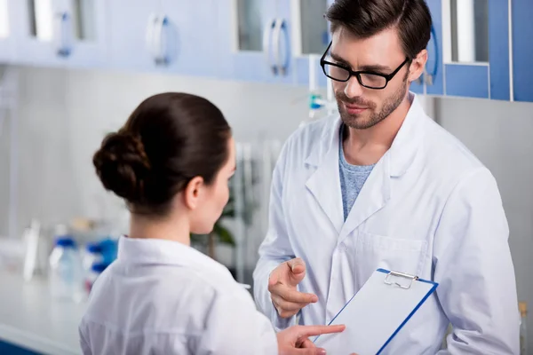 Scientists during work at laboratory — Stock Photo, Image