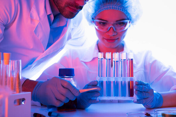 Scientists during work at laboratory 