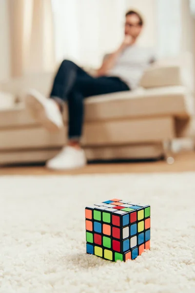 Rubik cube on carpet — Stock Photo, Image