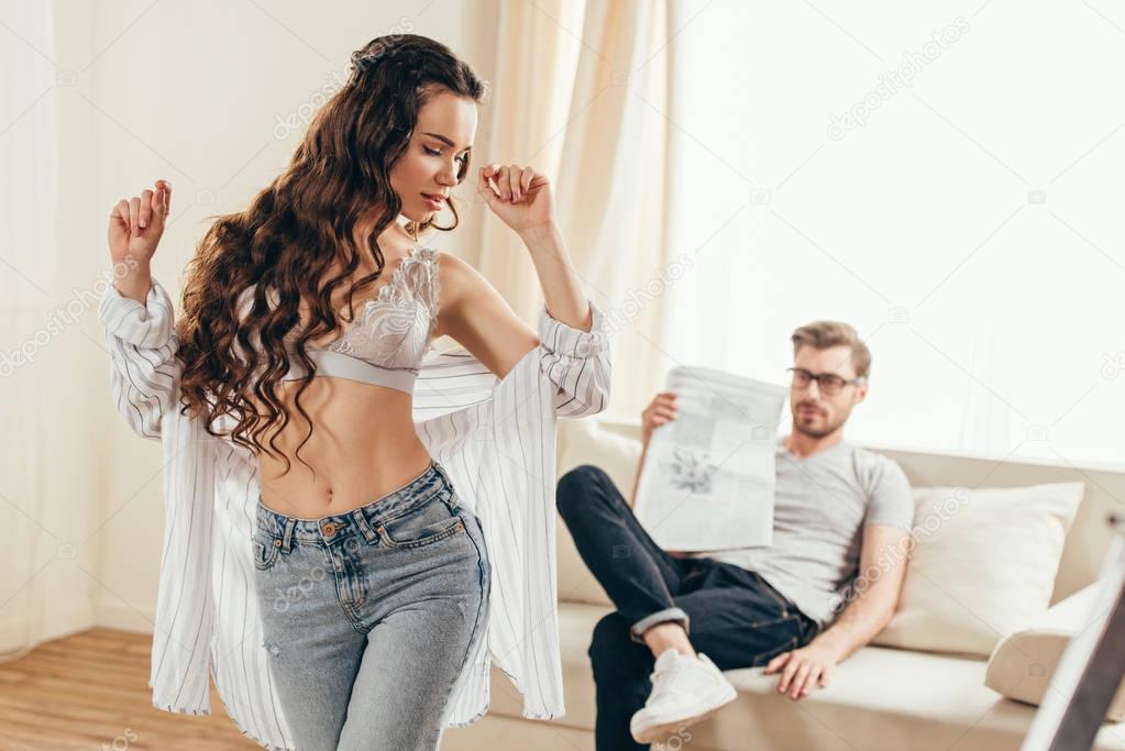 Young woman flirting with boyfriend 