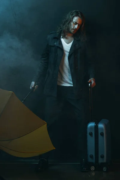 Young man with suitcase — Stock Photo, Image