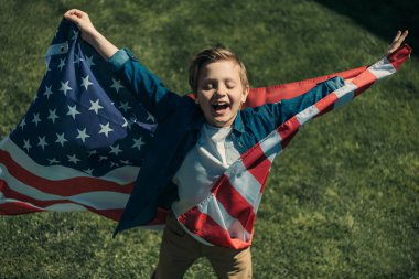 little boy with american flag clipart
