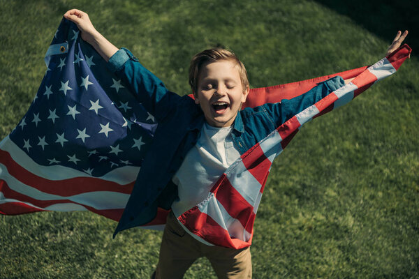 little boy with american flag