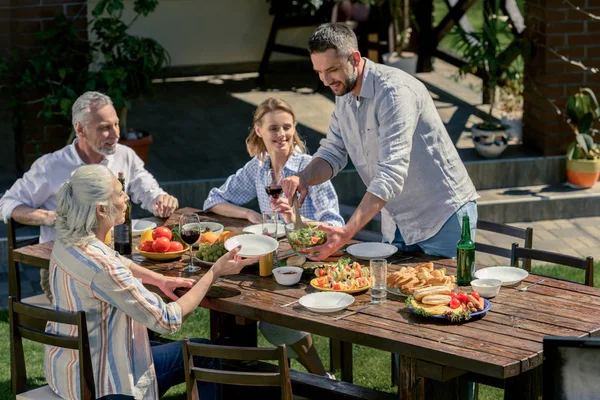 Family spending time together on picnic — Stock Photo, Image