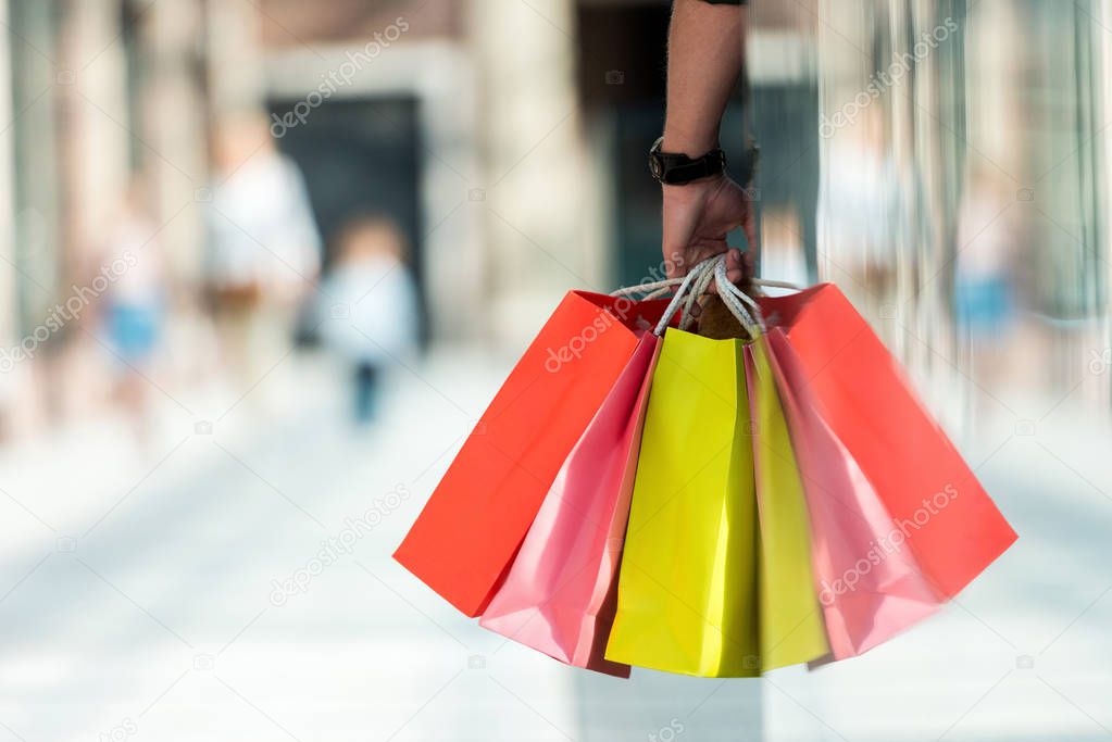 Man holding shopping  bags  Stock Photo  