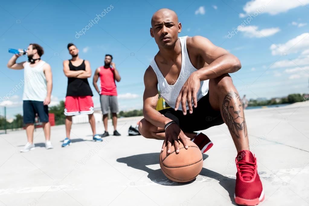 man with basketball ball