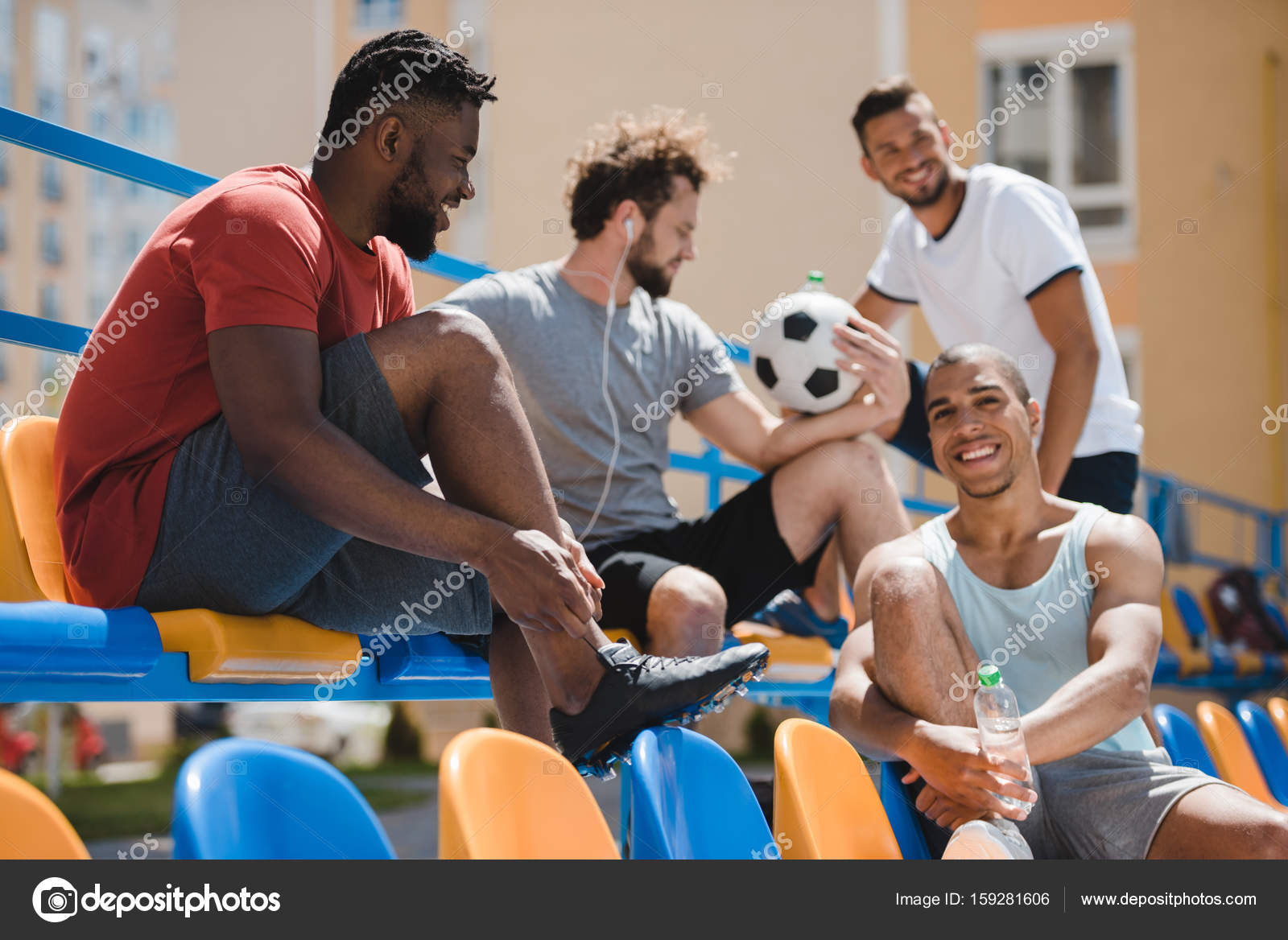 Multicultural soccer team Stock Photo by ©ArturVerkhovetskiy 159281606