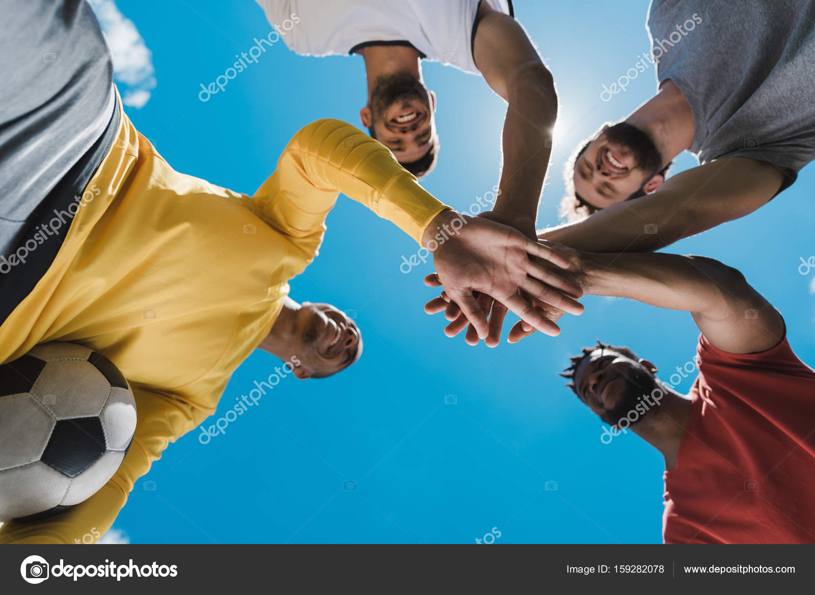 Multiethnic soccer team — Stock Photo © ArturVerkhovetskiy 159282078