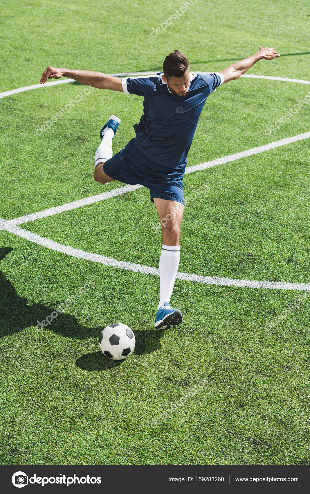 Soccer player with ball Stock Photo by ©ArturVerkhovetskiy 159283260