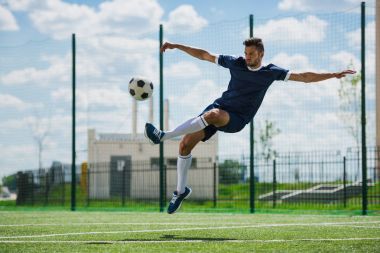 soccer player with ball clipart