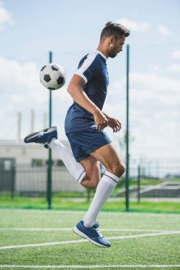 soccer player with ball clipart