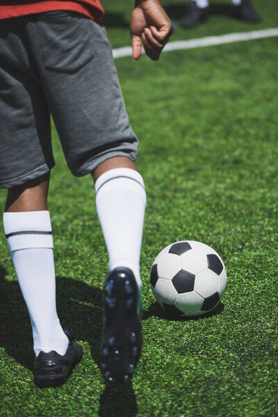 soccer player with ball