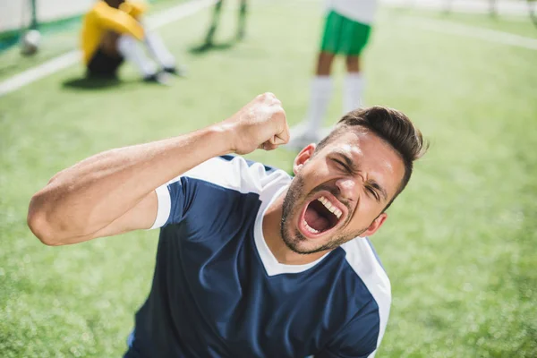 Happy soccer player — Stock Photo, Image