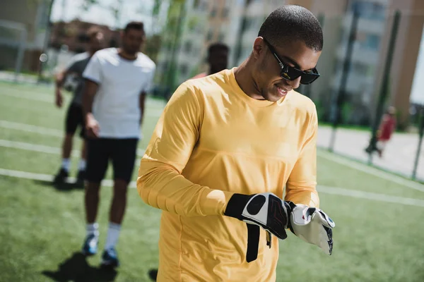 African american goalkeeper on pitch — Stock Photo, Image