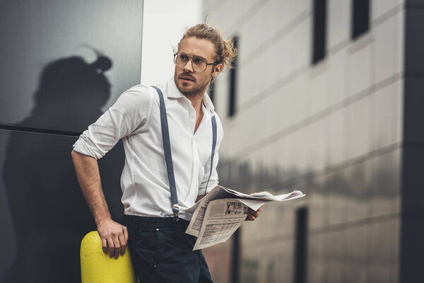 Stylish man with newspaper