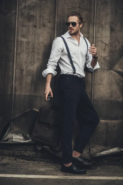 Stylish young man smoking — Stock Photo, Image