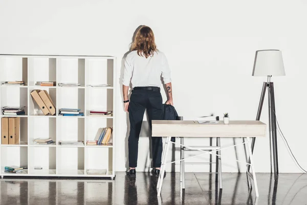 Businessman standing in office — Stock Photo, Image