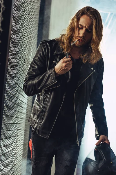 Stylish long haired man with cigarette — Stock Photo, Image